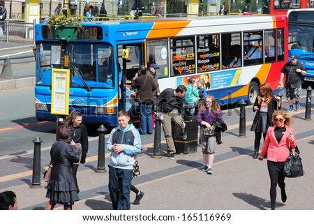 LIVERPOOL, UK - APRIL 20: People ride bus on April 20, 2013 in Liverpool, UK. Liverpool City Region has a population of around 1.6 million people and is one of largest urban areas in the UK.