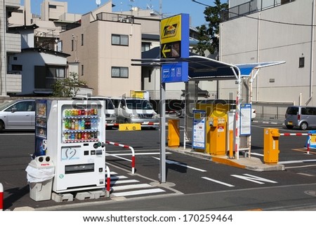 TOKYO - APRIL 12: 24h Times self service parking on April 12, 2012 in Tokyo. The operator manages more than 500,000 parking spaces, thus being one of largest parking operators in Japan.