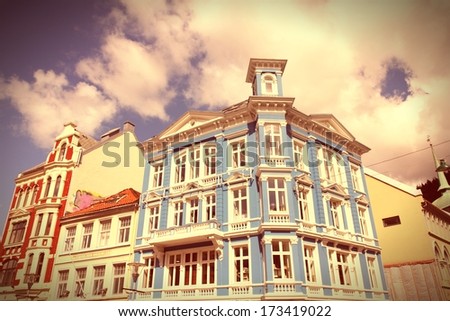 Beautiful old architecture in Bergen, Norway. Cross processed color tone - retro style.