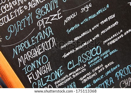 Restaurant menu in Italian - outdoor bar in Rome, Italy. Pizza and other Italian cuisine.