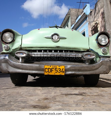Camaguey, Cuba - February 17, 2011: Vintage Oldsmobile Car Parked In Camaguey. Cuba Has One Of The Lowest Car-Per-Capita Rates (38 Per 1000 People In 2008).