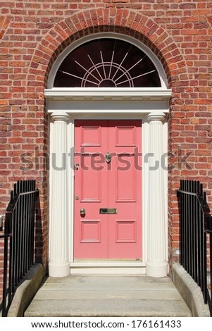 Liverpool - city in Merseyside county of North West England (UK). Old pink door, Georgian architecture style.