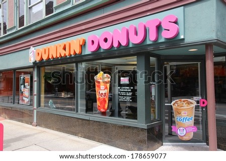 PROVIDENCE, USA - JUNE 8, 2013: Exterior of Dunkin Donuts shop in Providence. The company is the largest coffee and baked goods franchise in the world, with 15,000 stores in 37 countries.