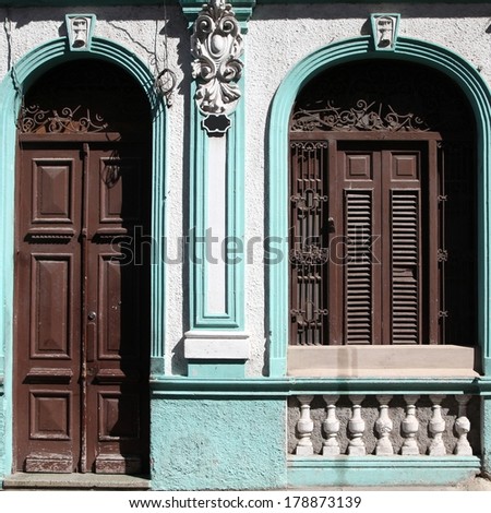 Santiago de Cuba - beautiful colonial architecture. Door and window. Square composition.