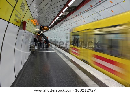 ESSEN, GERMANY - JULY 17, 2012: People wait at urban light rail station in Essen, Germany. Essen Transport (EVAG) had 123.7 million rides in 2009.