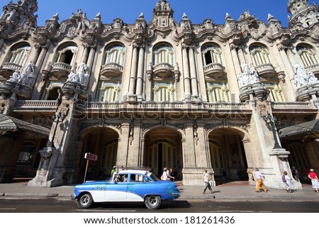 HAVANA, CUBA - FEBRUARY 27, 2011: People drive in Havana, Cuba. Cuba has one of the lowest car-per-capita rates (38 per 1000 people in 2008).