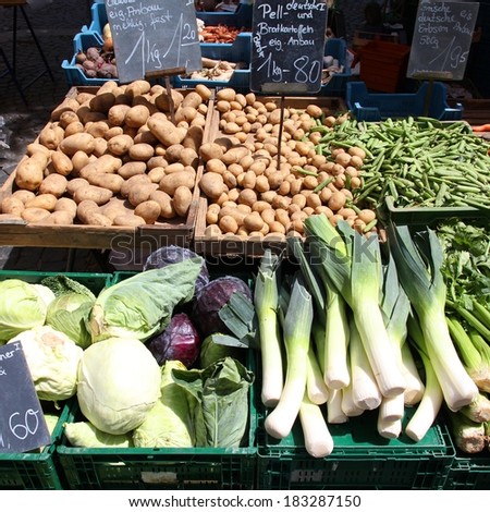 Vegetable stand at a marketplace in Mainz, Germany. Farmers market. Square composition.