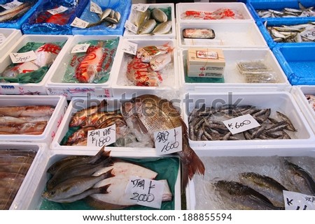 TOKYO, JAPAN - MAY 11, 2012: Seafood choice at famous Tsukiji Fish Market in Tokyo. It is the biggest wholesale fish and seafood market in the world.