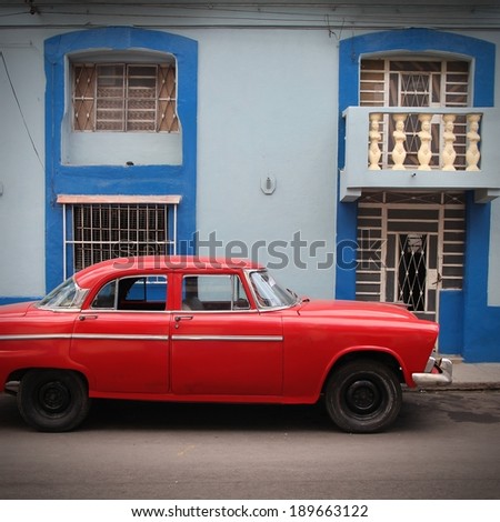 HAVANA - FEBRUARY 27: Oldtimer car parked in the street on February 27, 2011 in Cuba has one of the lowest car-per-capita rates (38 per 1000 people in 2008).