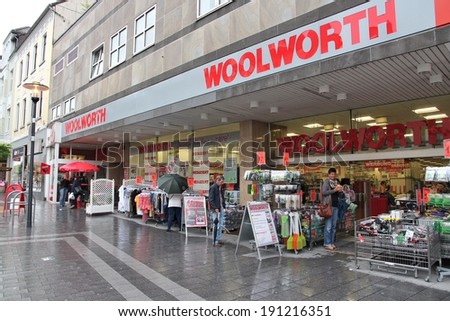 HATTINGEN, GERMANY - JULY 16, 2012: People visit Woolworth discount store in Hattingen, Germany. Woolworth GmbH plans to have 500 stores in Germany by 2015.