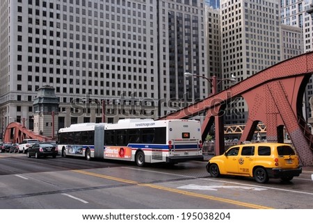 CHICAGO, USA - JUNE 26, 2013: People ride city bus in Chicago. Chicago is the 3rd most populous US city with 2.7 million residents (8.7 million in its urban area).