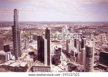 Melbourne, Australia - aerial city view with skyscrapers. Cross processed color tone - retro filtered style.