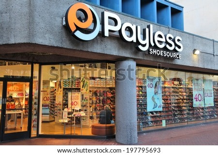 SAN FRANCISCO, USA - APRIL 8, 2014: Shoppers visit Payless Shoesource footwear store in San Francisco, USA. There were approximately 660 Payless ShoeSource stores in North America in 2011.