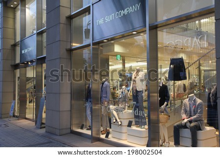 NAGOYA, JAPAN - MAY 3, 2012: Shoppers visit The Suit Company in Nagoya, Japan. SC one of largest retailers of business apparel in Japan and has 40 brand stores in largest cities.