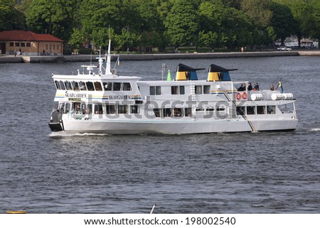 STOCKHOLM, SWEDEN - MAY 31, 2010: People ride Skargarden ferry in Stockholm, Sweden. In Stockholm, city of islands, ferries are the backbone of public transport.