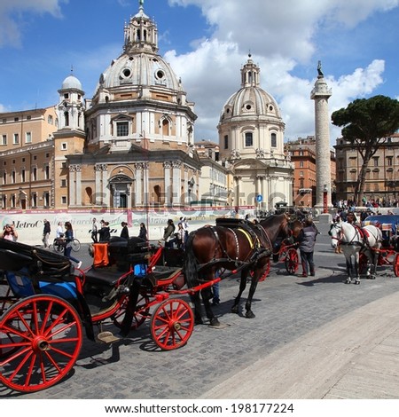 ROME, ITALY - APRIL 8, 2012: Tourists walk in Piazza Venezia in Rome. According to Euromonitor, Rome is the 3rd most visited city in Europe (5.5m international tourist arrivals 2009)