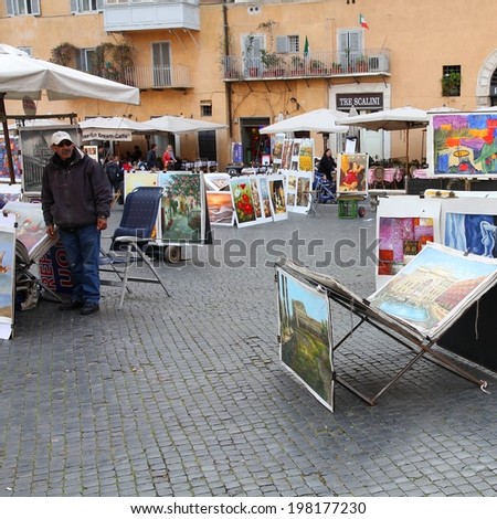 ROME, ITALY - APRIL 9, 2012: Tourists visit Piazza Navona in Rome. According to Euromonitor, Rome is the 3rd most visited city in Europe (5.5m international tourist arrivals 2009)