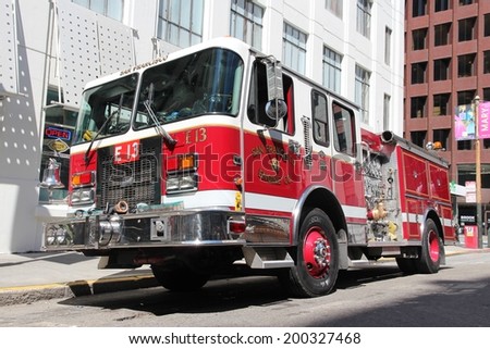 SAN FRANCISCO, USA - APRIL 9, 2014: San Francisco fire engine parked in the street. SF Fire Department responded to 120,536 emergency calls in 2012.