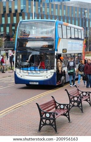 MANCHESTER, UK - APRIL 22, 2013: People ride Stagecoach city bus in Manchester, UK. Stagecoach Group has 16 percent bus market in the UK. Stagecoach UK employs 18,000 people.