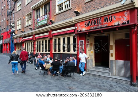LIVERPOOL, UK - APRIL 20, 2013: Smokie Mo\'s pub in Liverpool, UK. As of 2011 there were more than 50 thousand pubs in the UK. Pubs are a fundamental element of UK culture.