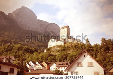 Sargans castle in Sarganserland region of canton St. Gallen. Alps in Switzerland. Cross processing color style - retro filtered tone.