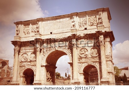 Italy - Rome. Famous triumphal arch - Arch of Constantine on Palatine Hill. Cross processed color style - retro image filtered tone.