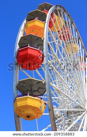 Ferris wheel in amusement park in Santa Monica, California, USA.