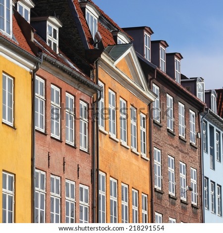 Copenhagen, Denmark - colorful buildings of Nyhavn street. Oresund region. Square composition.