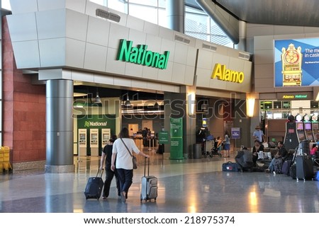LAS VEGAS, USA - APRIL 13, 2014: Alamo and National car rental airport office in Las Vegas. Both brands are owned by Enterprise Holdings, company employing 74,000 people (2013).