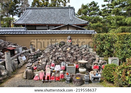 Kyoto, Japan - small jizo statues at famous Daitokuji (Daitoku-ji) Temple. Buddhist zen temple of Rinzai school. Jizo, also known as Ksitigarbha are bodhisattvas in East Asian Buddhism.