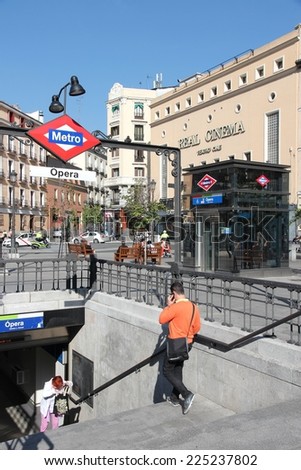 MADRID, SPAIN - OCTOBER 22, 2012: People enter Opera Metro station in Madrid. In 2011 Madrid Metro served 634 million rides. It exists since 1919.