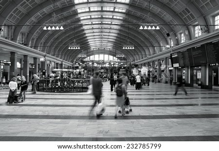 STOCKHOLM, SWEDEN - JUNE 1, 2010: People hurry in Central Station in Stockholm, Sweden. With 250,000 daily visitors, it is currently the largest travel centre in Nordic Europe.