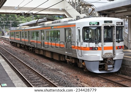 NAGISO, JAPAN - MAY 2, 2012: Central Japan Railway Company electric train of 313 series stands at Nagiso station. JR Central had 134 billion JPY in net income for 2011.