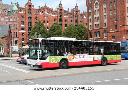HAMBURG, GERMANY - AUGUST 29, 2014: People ride public bus in Hamburg. Hamburger Hochbahn operates underground and most buses in Hamburg. It employs 4,300 people.