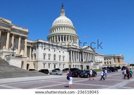 WASHINGTON, USA - JUNE 14, 2013: People visit the US Capitol in Washington DC. 18.9 million tourists visited capital of the United States in 2012.