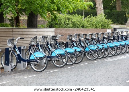 LONDON, UK - MAY 14, 2012: Community bikes station in London. Barclays Cycle Hire is one of most successful city bike networks worldwide with 5,000 bikes and 570 stations as of 2012.