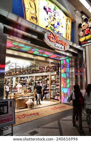 OSAKA, JAPAN - APRIL 24, 2012: Customers visit Disney Store in Osaka, Japan. Disney Stores is a retail company founded 1987. It has 360 stores in prestigious locations.