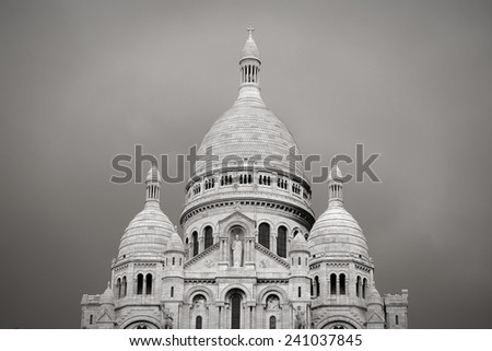 Paris, France - Basilica Sacre Coeur in Montmartre. UNESCO World Heritage Site. Black and white tone - retro monochrome style.
