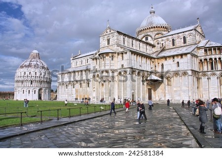 PISA, ITALY - OCTOBER 22, 2009: People visit the cathedral in Pisa, Italy. Duomo square is a UNESCO World Heritage Site and Italy is the 5th most visited country in the world (46 million in 2012).