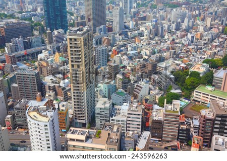 TOKYO, JAPAN - MAY 10, 2012: Modern cityscape view in Tokyo, Japan. Tokyo is the capital city of Japan and the most populous metropolitan area in the world with almost 36 million people.