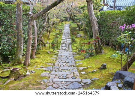 Kyoto, Japan - zen garden at famous Ryoanji (Ryoan-ji) Temple. Buddhist zen temple of Rinzai school.
