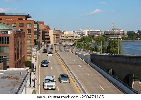 WASHINGTON, USA - JUNE 14, 2013: People drive Whitehurst Freeway in Washington DC. 646 thousand people live in Washington DC (2013) making it the 23rd most populous US city.