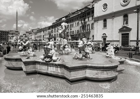 ROME, ITALY - MAY 13, 2010: Tourists visit Piazza Navona in Rome, Italy. According to Euromonitor, Rome is the 3rd most visited city in Europe (5.5m international tourist arrivals 2009).