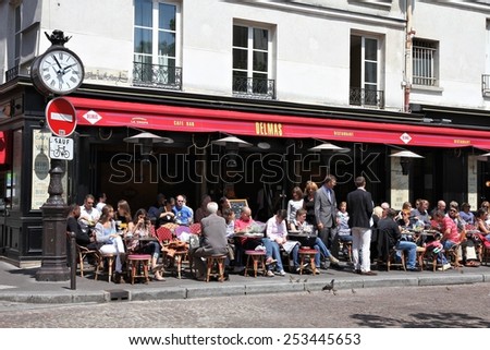PARIS, FRANCE - JULY 20, 2011: People visit Cafe Delmas in Paris, France. Paris is the most visited city in the world with 15.6 million international arrivals in 2011.