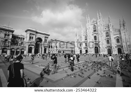 MILAN, ITALY - OCTOBER 6, 2010: People visit Piazza Duomo in Milan, Italy. As of 2006, Milan was the 42nd most visited city worldwide, with 1.9 million annual international visitors.
