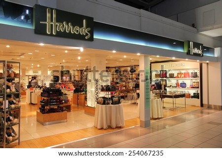 LONDON, UK - APRIL 16, 2014: Harrods store at London Heathrow Airport, UK. Heathrow is the busiest airport in Europe. It handled 73.4 million passengers in 2014.