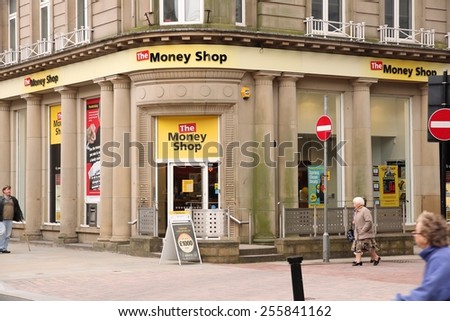 BOLTON, UK - APRIL 23, 2013: The Money Shop in Bolton, UK. Money Shop is part of Dollar Financial Group, provider of retail financial services. DFG employs 4,226 people.