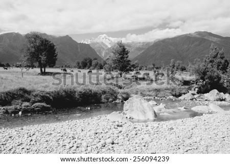 Mountain landscape including Mount Tasman of Southern Alps, New Zealand. Black and white tone - retro monochrome color style.
