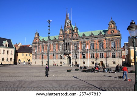 MALMO, SWEDEN - MARCH 8, 2011: People visit Old Town in Malmo. It is the 3rd largest city in Sweden with 303,873 residents.