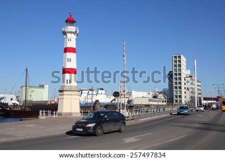 MALMO, SWEDEN - MARCH 8, 2011: People drive in Malmo. It is the 3rd largest city in Sweden with 303,873 residents.